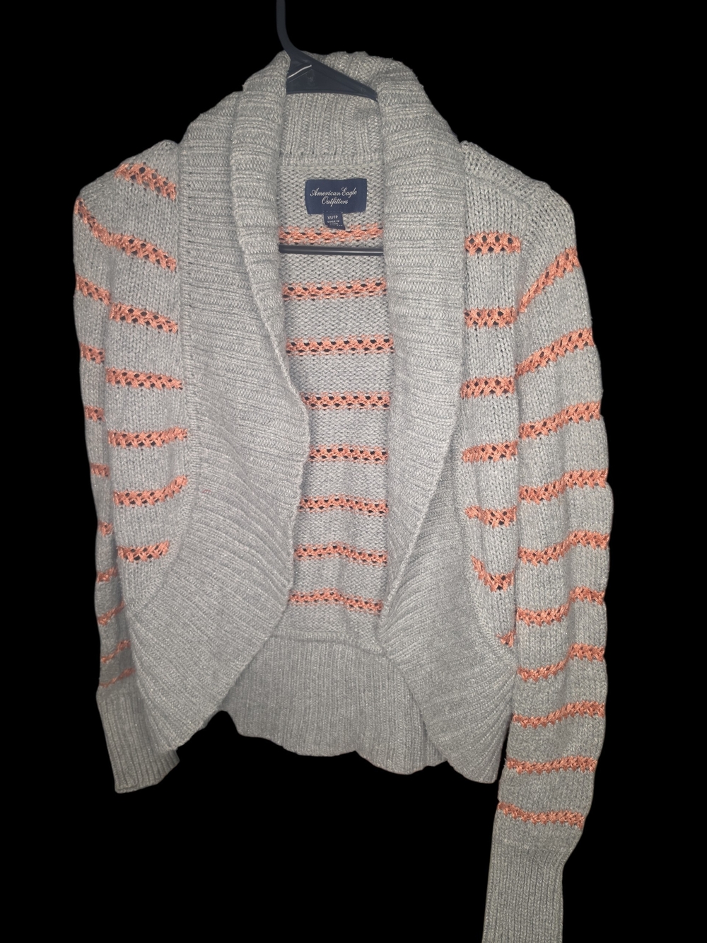 American Eagle Outfitters gray knit shawl cardigan with orange accent stripes.